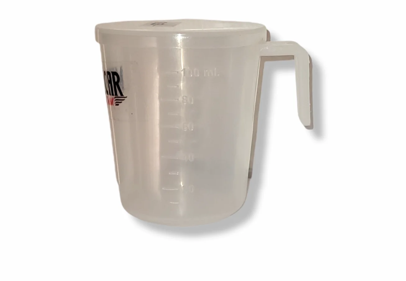 Jarra Dosificadora de 100 ml, con Tapa. 